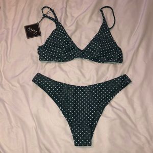 Green and white polka dot bikini